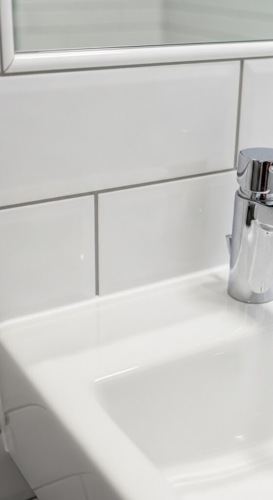 13+ Budget-Friendly Ideas for a Stunning Bathroom Makeover 12 Refresh Grout and Caulk for a Clean Finish